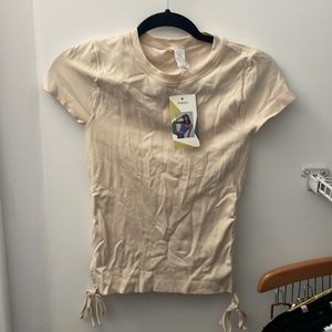Tan top cinched at sides